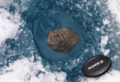 Meteorite entombed in ice, Tagish Lake. Courtesy, Alan Hildebrand, University of Calgary & Peter Brown, University of Western Ontario http://aquarid.physics.uwo.ca/~pbrown/tagish/