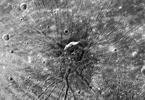 Figure. 1 The ‘Spider’, revealed in an image sent back by MESSENGER, 14.1.2008. The volcano, circumscribed by a faint, white annular marking, is about 330 km in diameter.