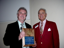 President of the SOciety, Dr Richard Fortey FRS (left) receives the AGI Explorer Award from Mr Larry Woodfork