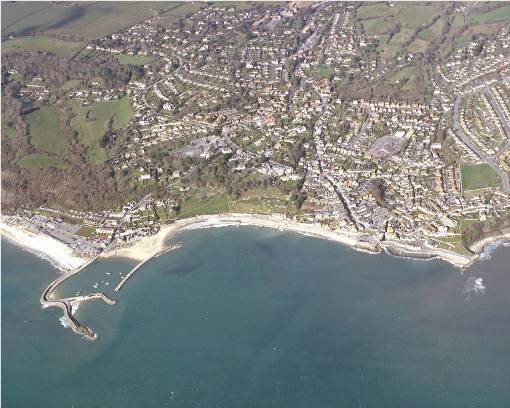 1. Aerial photograph of Lyme Regis showing the central area of landslipping. The Cobb, Lyme’s ancient harbour, is seen to the west. Copyright permissions, West Dorset District Council.