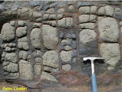 Spheroidal weathering by hydrolysis, Holy Island, Anglesey.