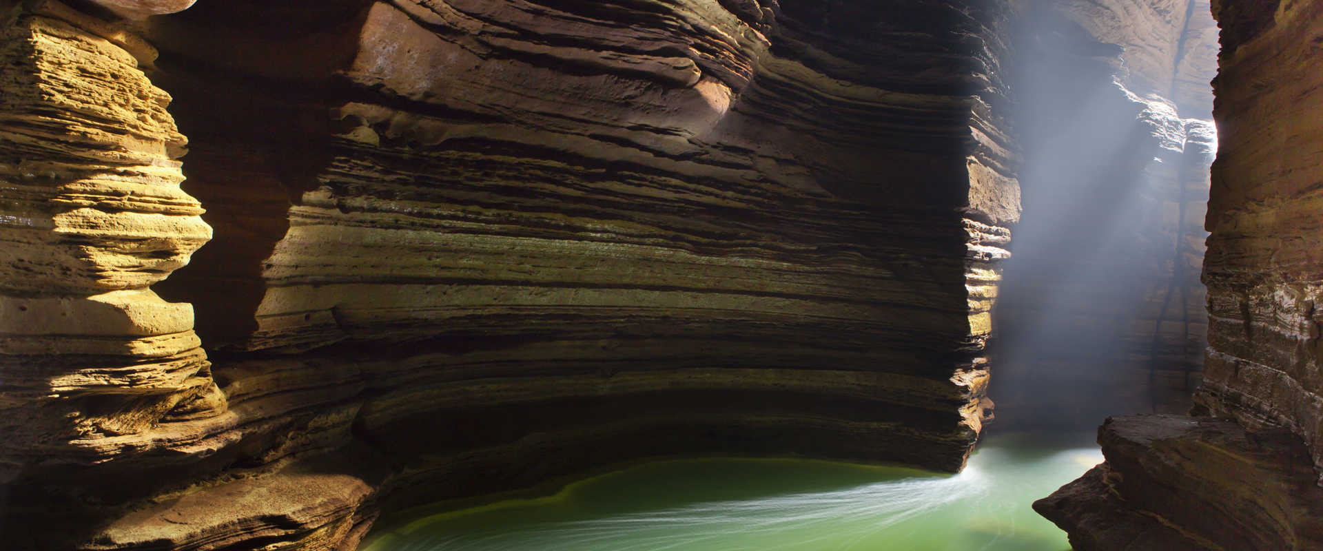 SL Shutterstock 127362263 Cave With Lake