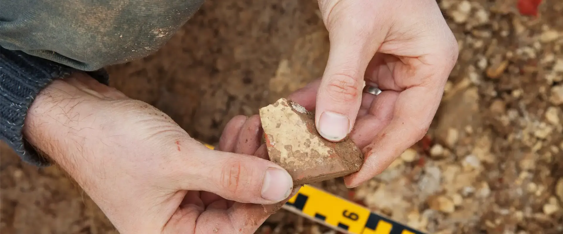 Closeup Examining Rock
