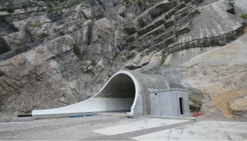 tunnel set within the base of a mountain under construction