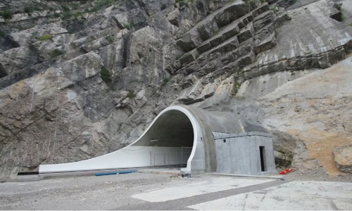 tunnel set within the base of a mountain under construction