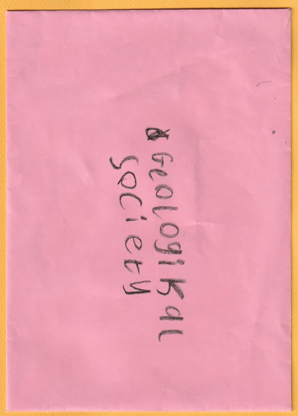 A scan of a pink enveloped addressed to the Geological Society