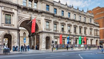 Large period building with arched entrance which is home to the Geological Society