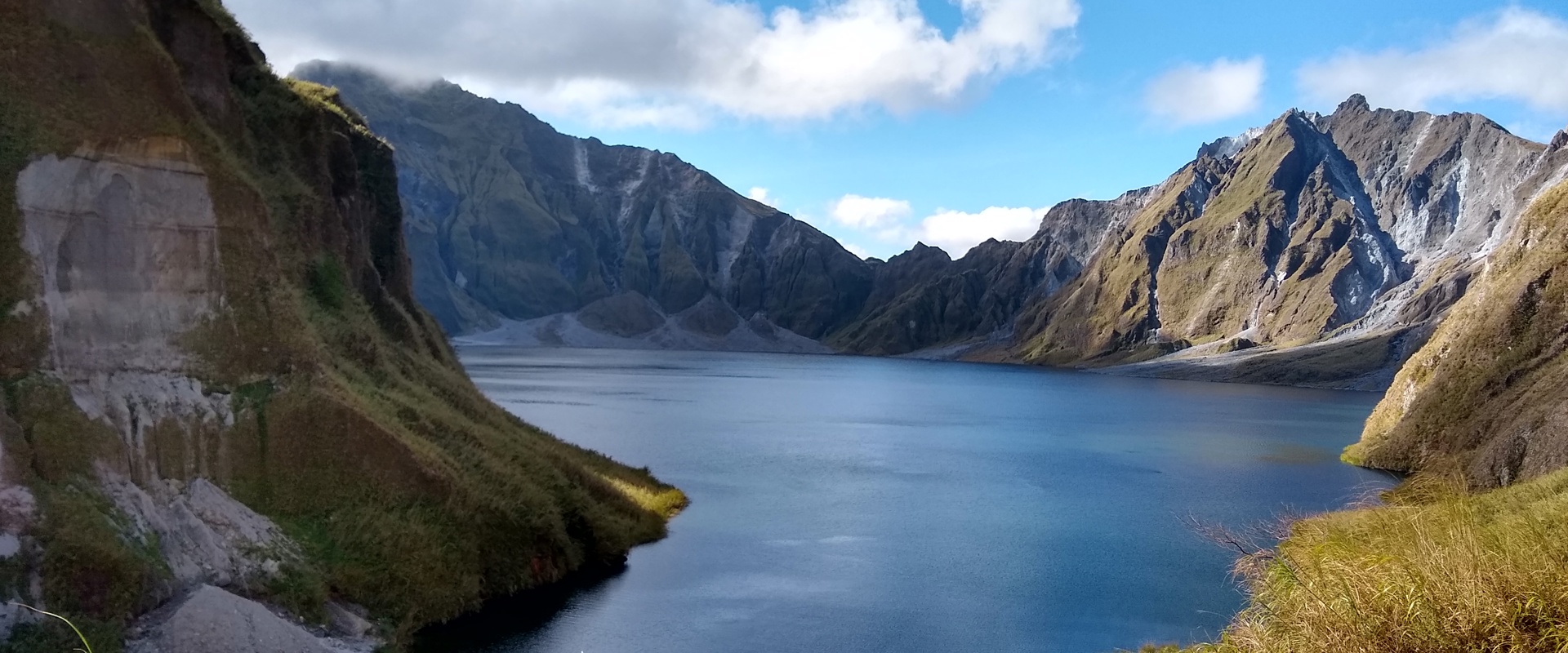 mountains with a blue lake in front of it