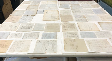 Photograph showing the letters drying after being washed