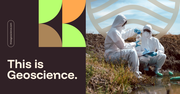 this is geoscience in writing to the left of the image with two people in white hooded bodysuits kneeling on the grass with research samples in their hands