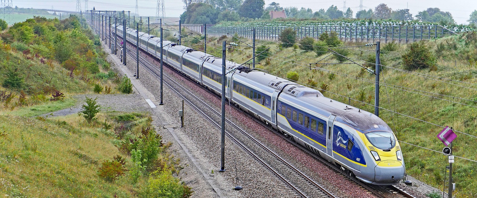 a eurostar train travelling through the countryside