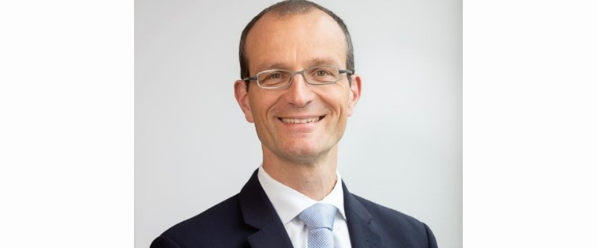 Image of a man in a suit