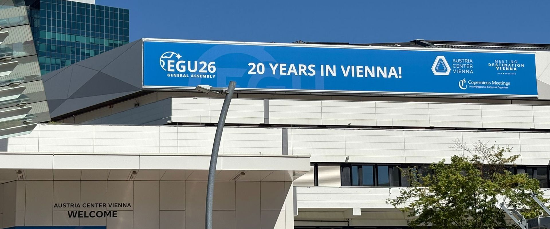 Austria Center Venna entrance with an EGU26 welcome banner