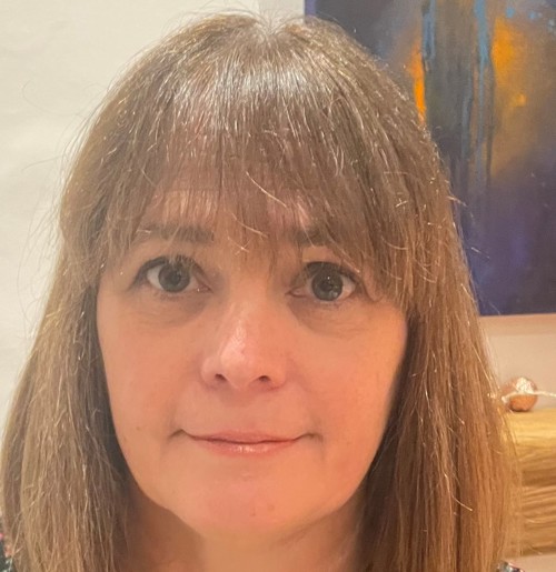 woman with long hair and fringe